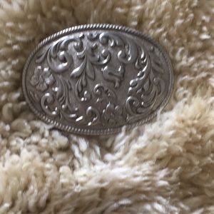 Silver belt buckle